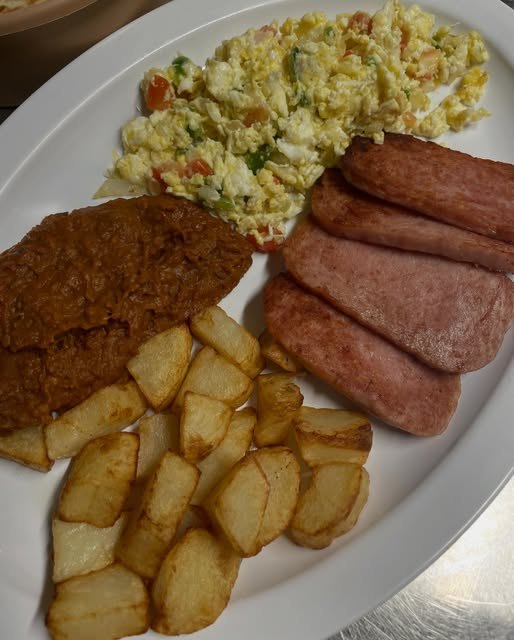 Plate with rice, beans and meat
