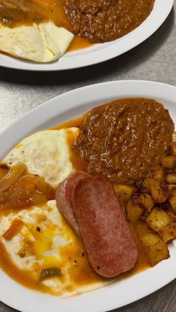Breakfast plate with eggs and tacos